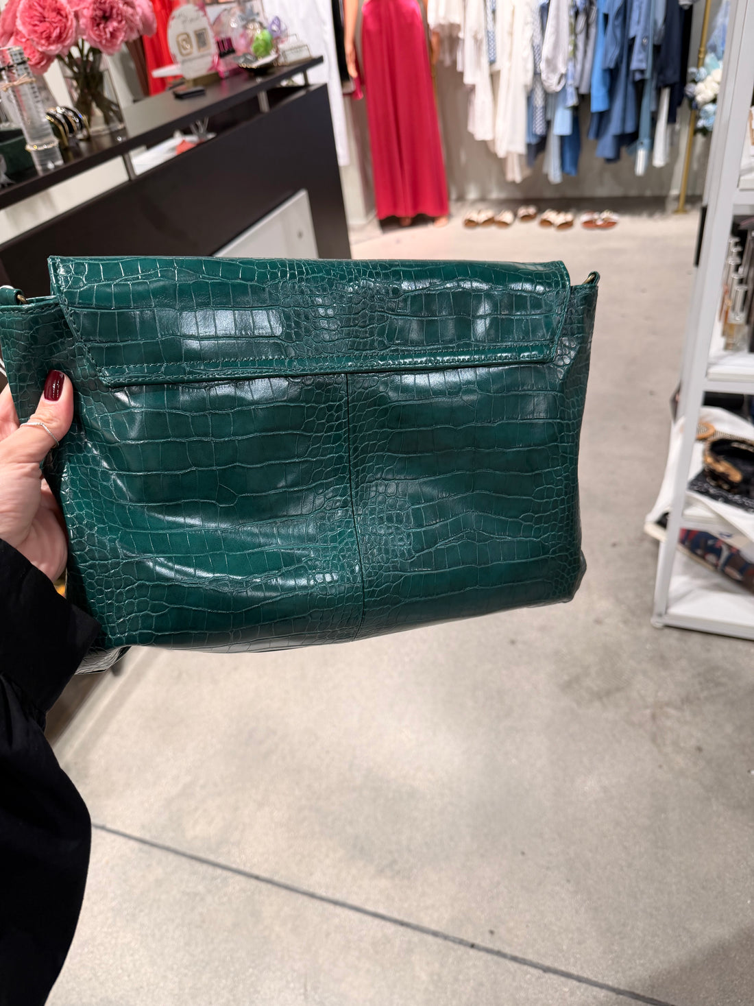 Crocodile print clutch with wrist strap